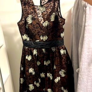 Brown floral flared cocktail dress. Size 4 taken in slightly at the waist.